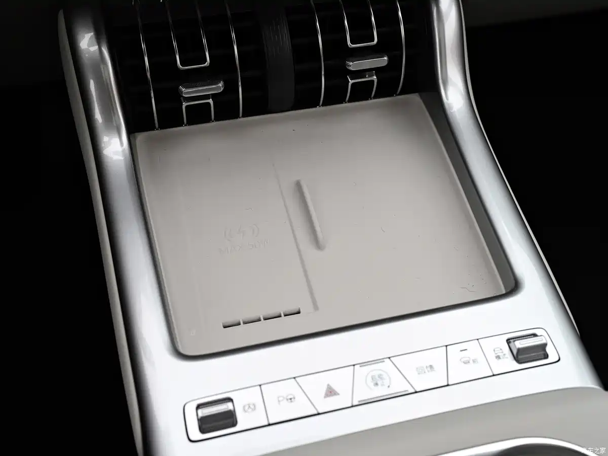 BYD Yuan Plus interior with large touchscreen, wireless charging pad, and ambient lighting