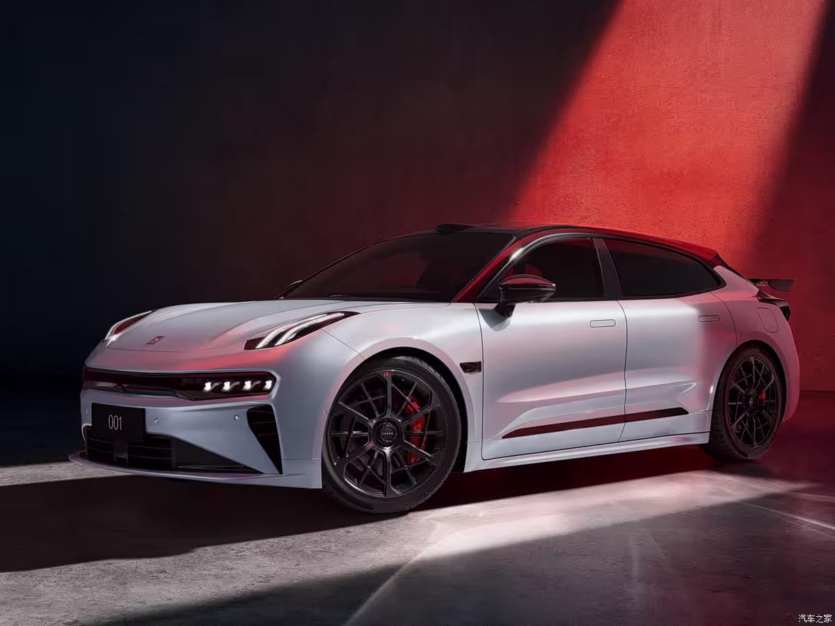 Zeekr 001 Fifth Anniversary Edition in Glacier Silver with black roof and carbon fiber spoiler