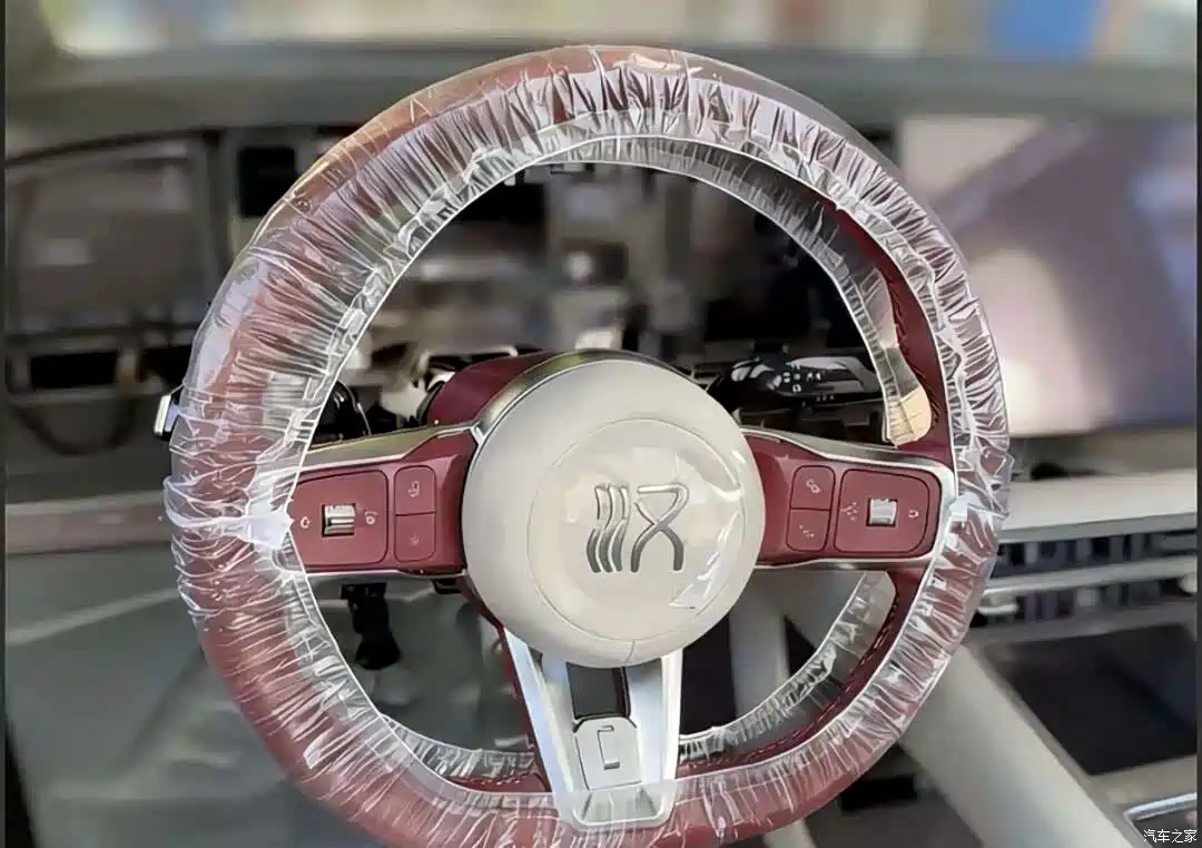 2026 BYD Han interior dashboard with Tang-shared steering wheel layout