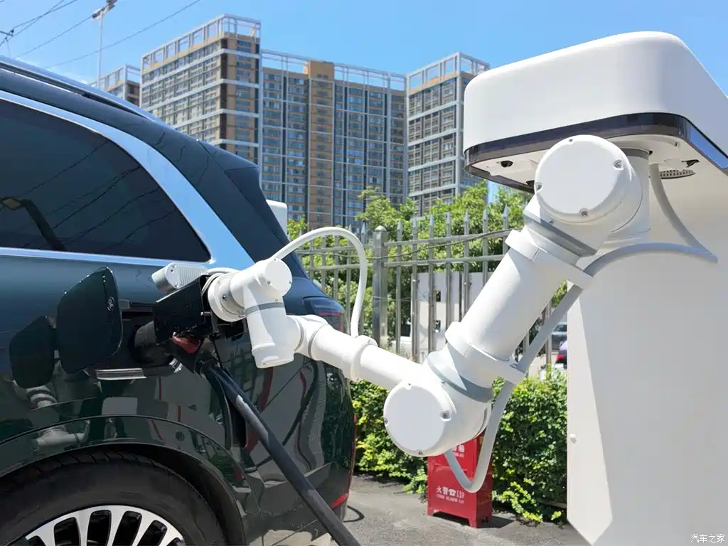 "Xiaomi robotic charging arm automatically plugging into an electric vehicle at home"